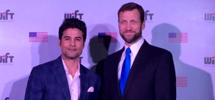 Two men standing. (Photo Credit: State Department)