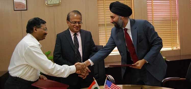 Two men shaking hands. (Photo Credit: State Department)
