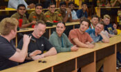Crew members from the U.S. Navy’s P-8A Poseidon aircraft interact with students from Vellore Institute of Technology (VIT) University in Vellore on Thursday, April 10.