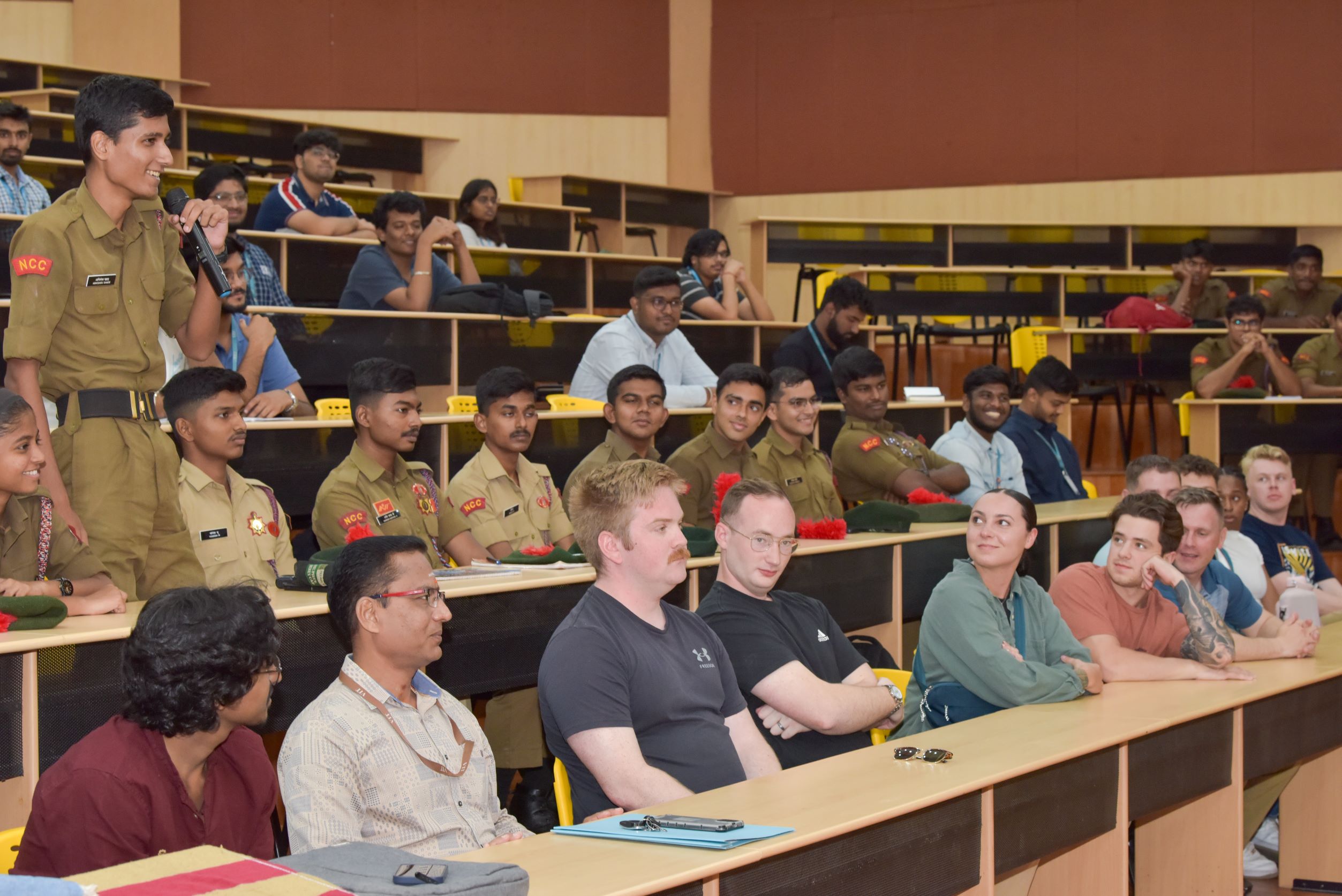 Crew members from the U.S. Navy’s P-8A Poseidon aircraft interact with students from Vellore Institute of Technology (VIT) University in Vellore on Thursday, April 10.